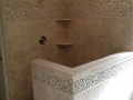 Tile_shower_knee_wall_double_shelf